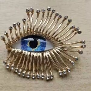 Mystic Gaze Gold Sunburst Crystal Blue Eye Motif Brooch